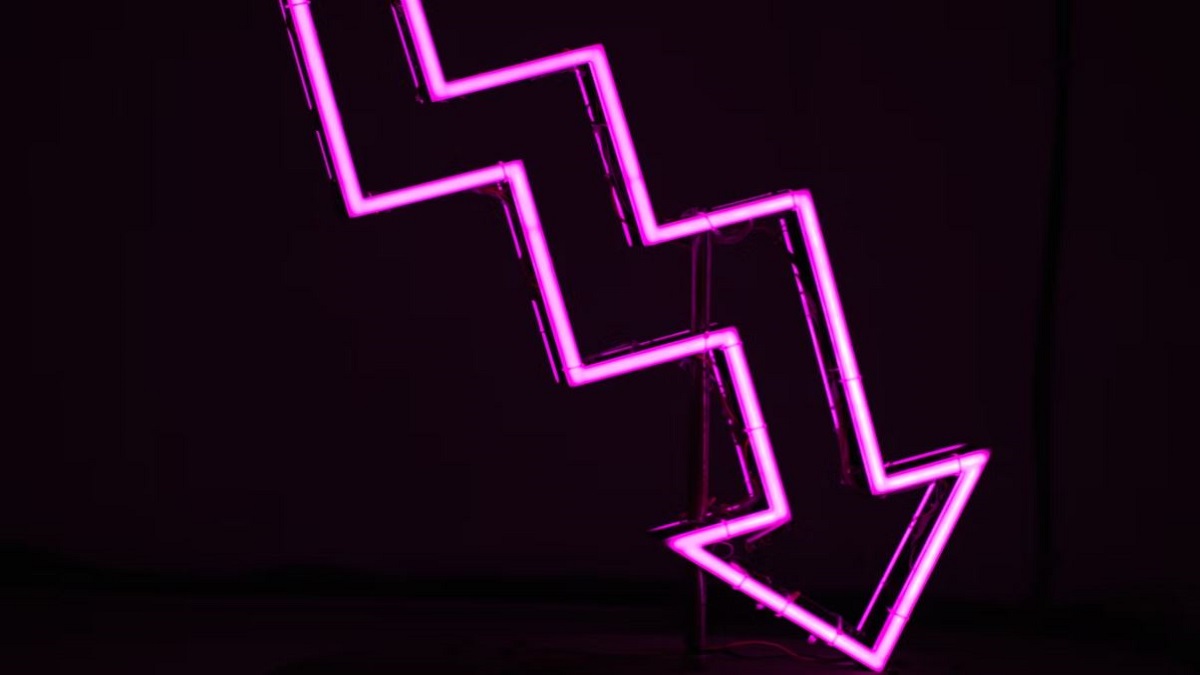 Purple neon arrow light, staggered as it points downwards